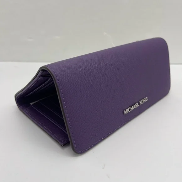 Michael Kors Lg Jet Set Travel Trifold Leather Wallet 
Dark Purple 
NWT - Picture 8 of 16